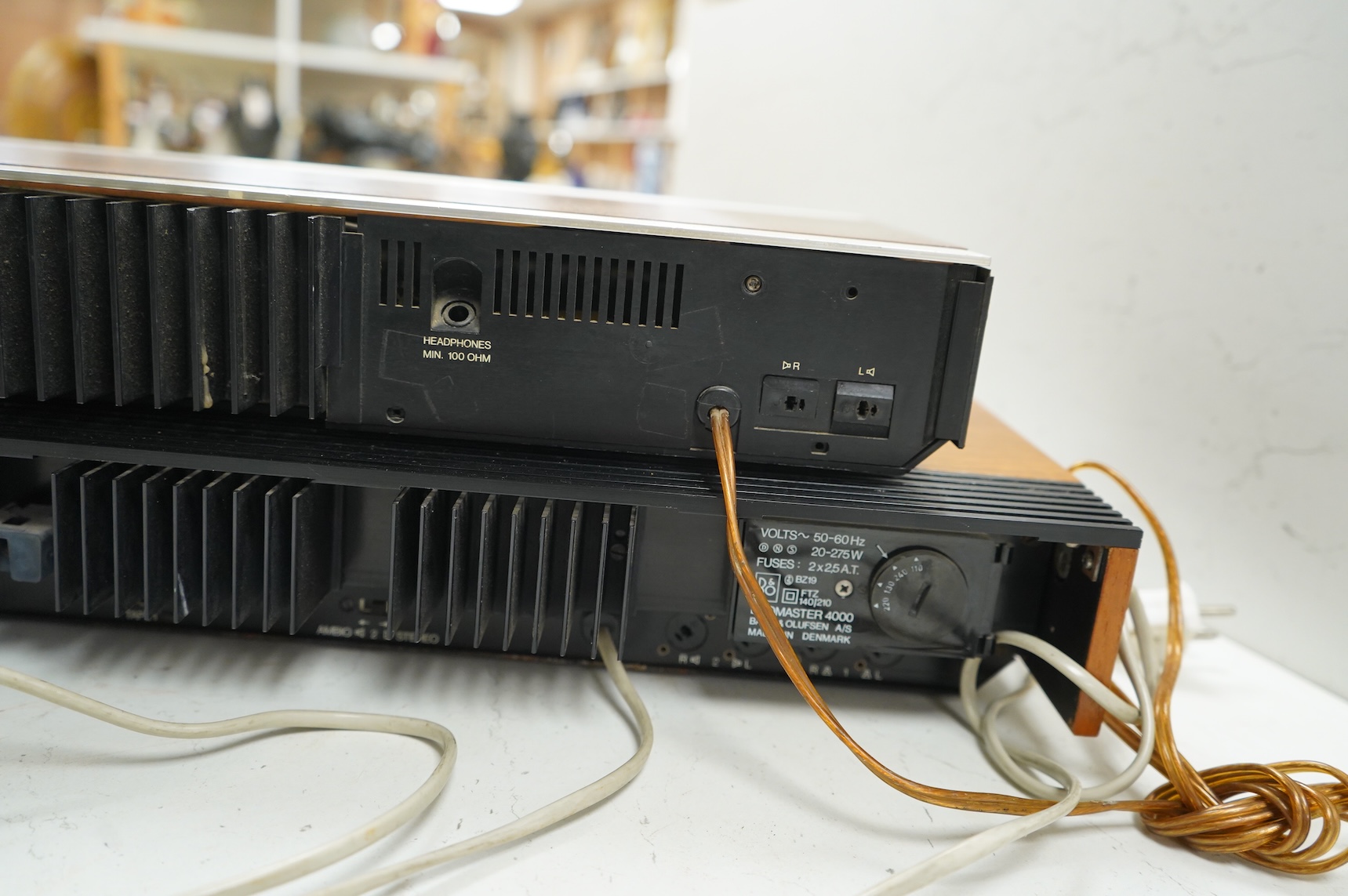 Four Bang & Olufsen stereo items; a Beogram 1000 type 5229 turntable, a Beomaster 4000 type 2406, a Beomaster 901 type 2606, and a Beomaster 1900 type 2903